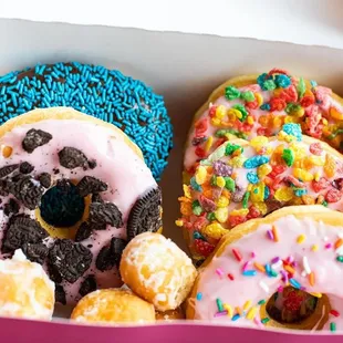 a variety of donuts in a box