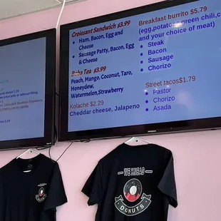 t - shirts hanging on a wall