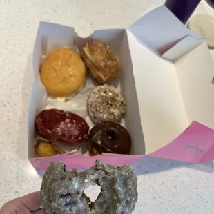 Crème filled, croissant, red velvet, blueberry, chocolate cake, and white cake with nuts