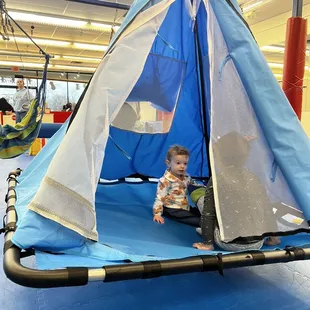 Swinging tent. Great for all abilities of children.