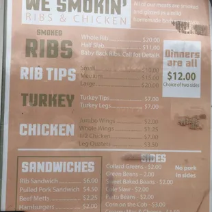 Menu in the window of the food truck.