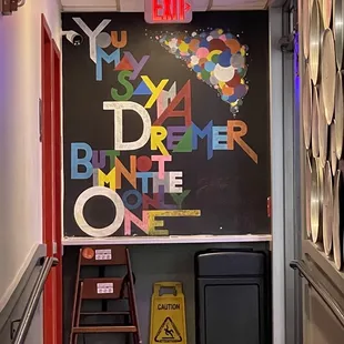 a blackboard in a hallway