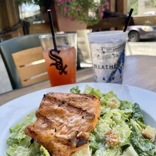 Seared salmon Caesar salad, pineapple mocktail