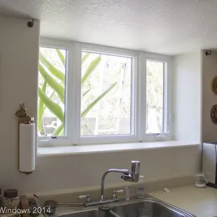 Milgard Tuscany Casement Windows Flanking a Picture Window