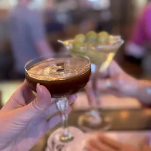 Espresso martini and a dirty martini with bleu cheese olives