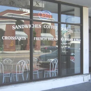 the reflection of the restaurant across the street