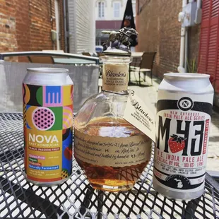 a bottle of mova and a can of mova