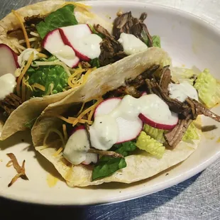 two tacos on a plate