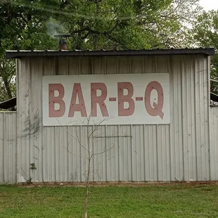 a sign on the side of a building