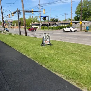 a sign on the side of the road