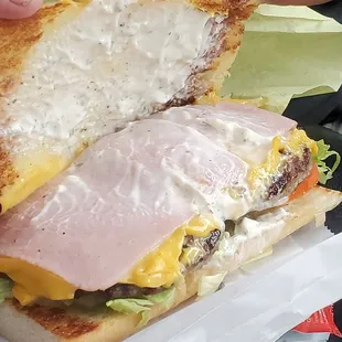 Penney Special  2 patties , ham, cheese, lettuce,mayonnaise, tomato and onions