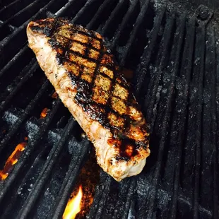 a steak on a grill