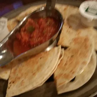 a plate of quesadillas