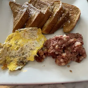 French Toast Platter and my sides were corn beef hash and scrambled eggs.
