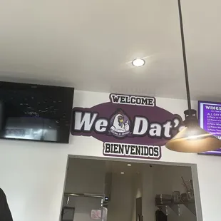 We Dat&apos;s Signage with partial menu