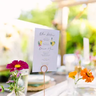 Rented menu holders and bud vases