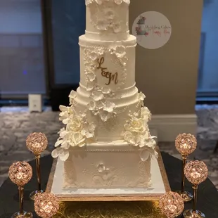 Mixed shaped Elegant wedding cake with beautiful sugar flowers