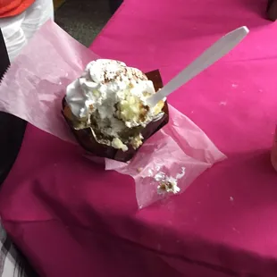 This is the Tiramisu cupcake with a bite taken out from the Greater Youngstown Italian Festival