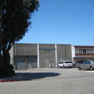 a parking lot with parked cars