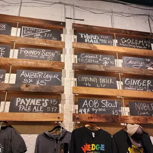 a variety of t - shirts on display