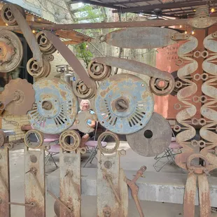 a man sitting at a table in a cafe