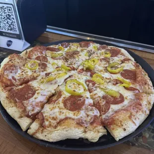 Pepperoni and banana pepper pizza