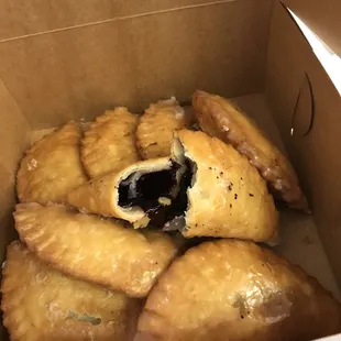 Amazing from scratch glazed fried pies. So incredibly delicious and right out of the oven. We got BlackBerry, apple and peach!