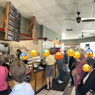 a group of people in a restaurant