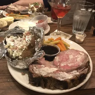 11 oz. Wedgwood Cut Prime Rib, baked potato with all the trimmings, and the special Manhattan!