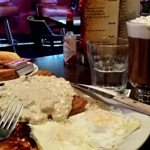 Chicken Fried Steak, Over Medium Eggs...and i asked for the hashbrowns well done.  A Wedgwood Nudge washes it all down.