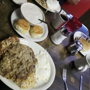 Chicken fried steak with biscuits and gravy, side of pancakes
