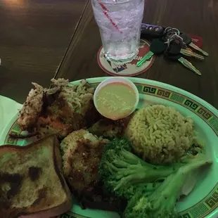Had the homemade crabcakes broccoli and yellow rice they were succulent checked 1-2
