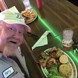 Here I am with the homemade crabcakes yellow rice and broccoli they were succulent check 1-2