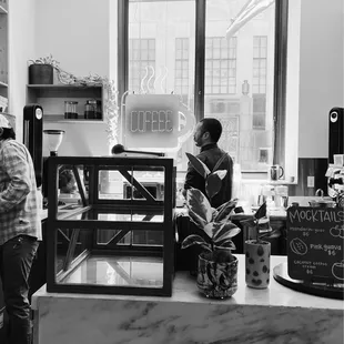 two people in a coffee shop