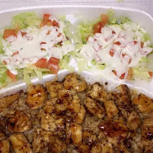 a meal in a styrofoam container