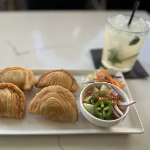 The basil mojito doesn&apos;t have much basil taste and could use more alcohol. . The curry puffs fillings are too sweet.  Disappointed