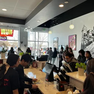 a group of people in a restaurant