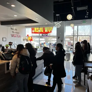 a group of people in a restaurant