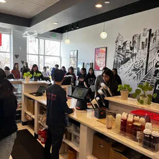 a group of people at a counter