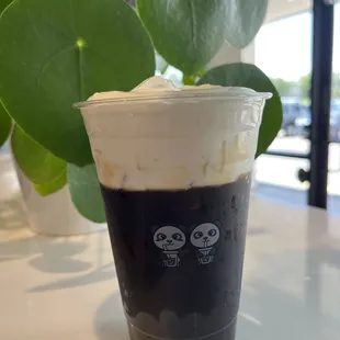 a cup of coffee on a table