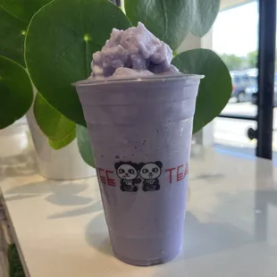a cup of purple ice cream