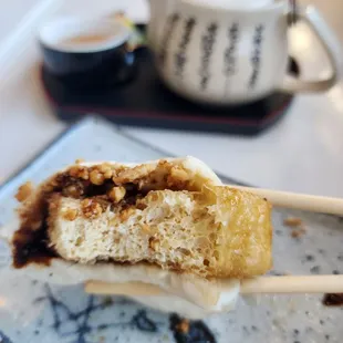 Tofu Steam Bun with peanut dark sauce