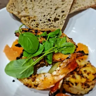 GRILLED SHRIMP roasted garlic + cara cara orange + aleppo pepper + rye toast