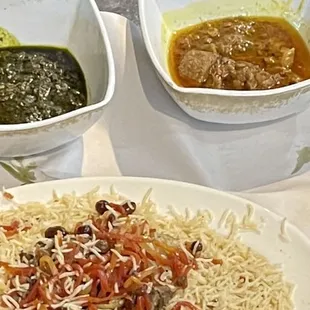 a plate of noodles, tortillas, salsa, and guacamole