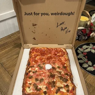 Brooklyn Square, half pepperoni and half sausage.