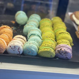 Cake macaron, raspberry macaroon, caramel apple macaron, (can&apos;t remember green ones), and cookies and cream.