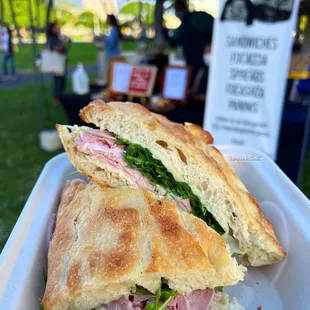 a sandwich in a styrofoam container