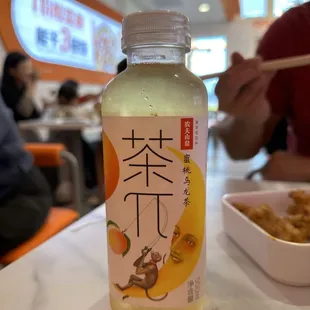 a bottle of food on a table