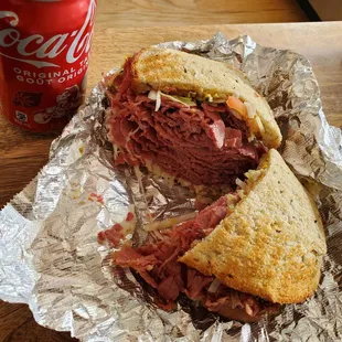 Corned been sandwich with onion, lettuce, and tomato