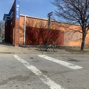 a bicycle parked in front of a building